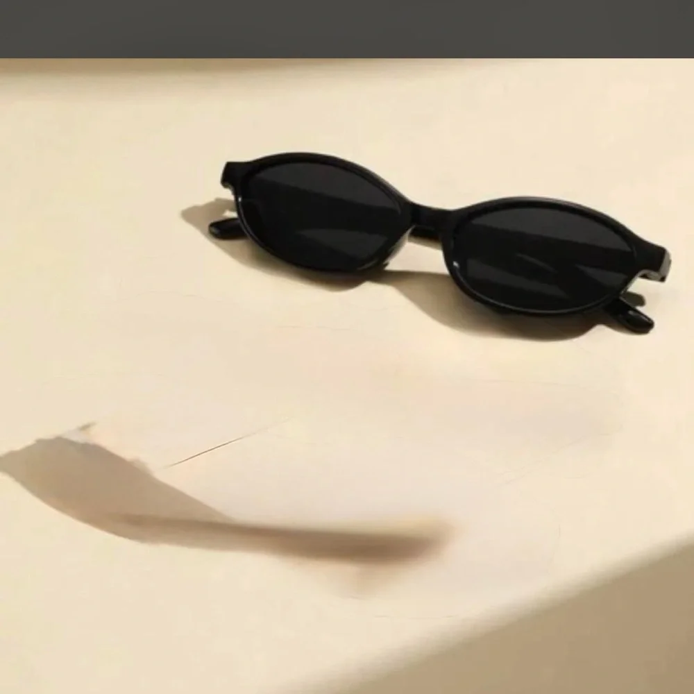 Brand new Classic Black Cat-Eye Sunglasses - Women